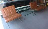 Pair of Barcelona Chairs, Ottoman and Glass Table
